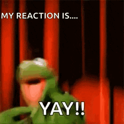 kermit the frog is standing in front of a red curtain and says `` my reaction is ... yay ! ''