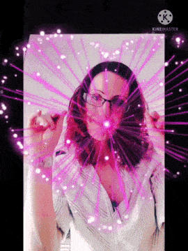 a woman wearing glasses is surrounded by pink lights and the words kinemaster on the bottom left