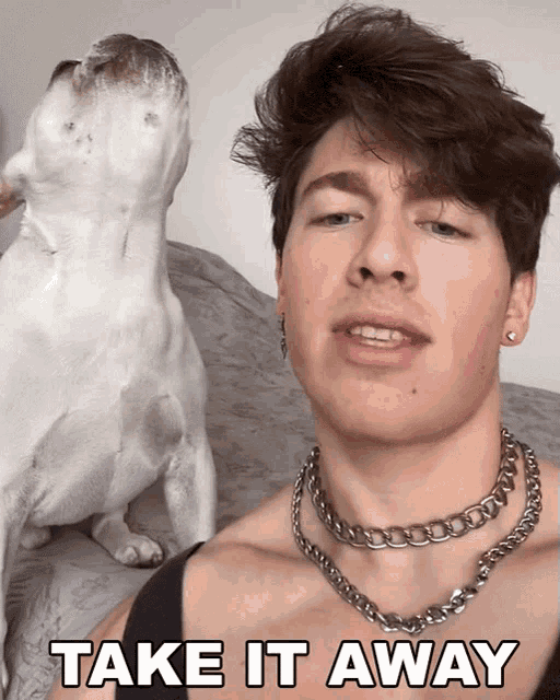 a man with a dog behind him and the words take it away