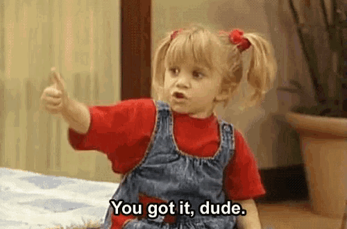 a little girl is giving a thumbs up and says you got it dude .