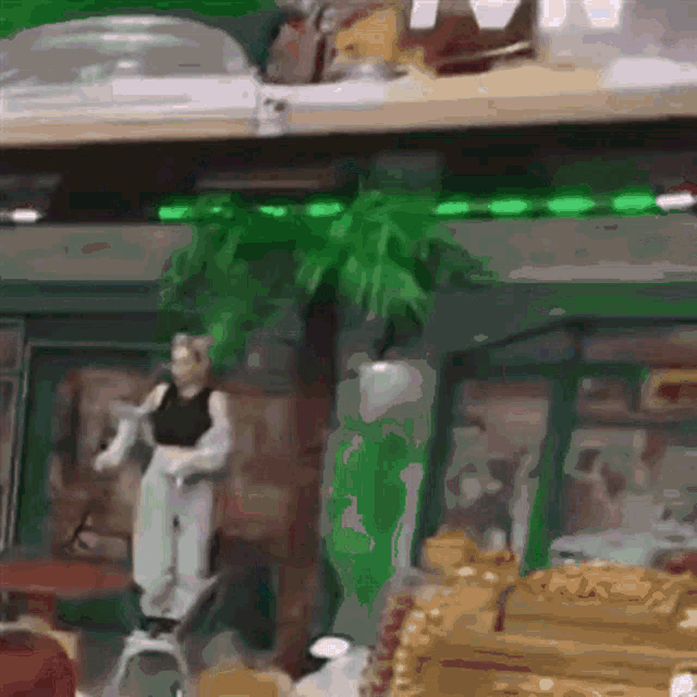 a statue of a man standing on a ladder in a store