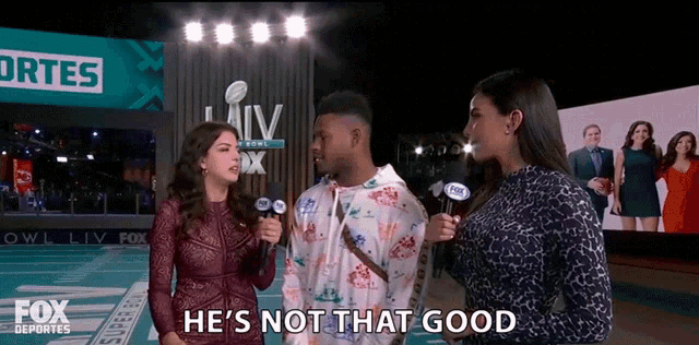 a man is being interviewed by two fox reporters