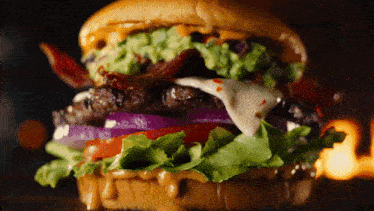 Carls Jr Guacamole Bacon Burger GIF - Carls Jr Guacamole Bacon Burger Fast Food GIFs