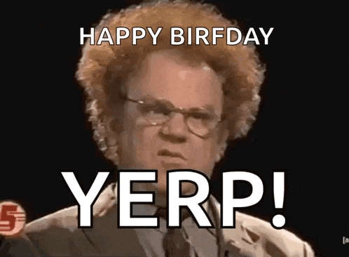 a man with curly hair and glasses is giving a speech and says happy birfday yерр !