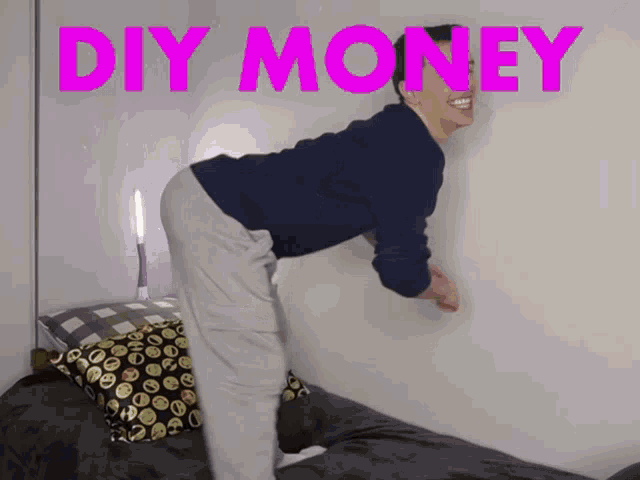 a man is bending over in front of a wall with the words diy money above him