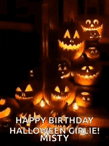 a bunch of pumpkins are lit up in a dark room and they are saying happy birthday halloween girlie !
