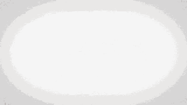 a black car with a red stripe on the side is driving on a white background