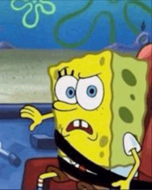 spongebob squarepants is wearing a seat belt on a car .