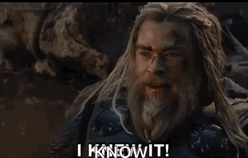 a man with long hair and a beard says i knowit
