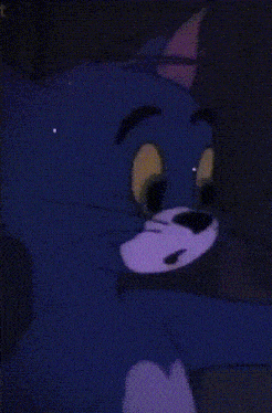 a close up of a cartoon cat 's face with an angry look on his face