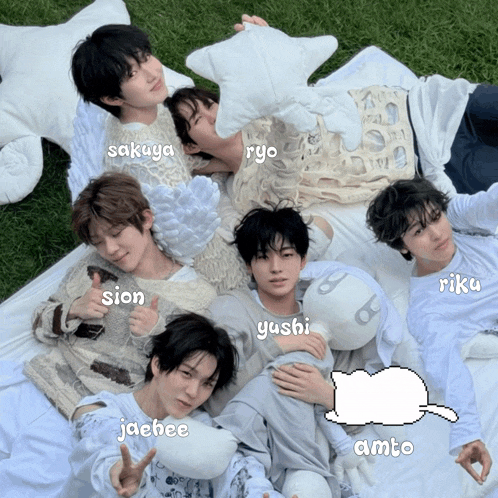 a group of young men laying on a blanket with the names sion jaebee ryo and riku
