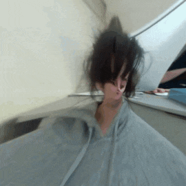a blurry picture of a person 's face and hair