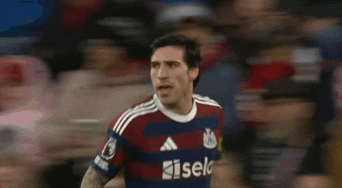 a soccer player wearing a shirt that says kiselo on it