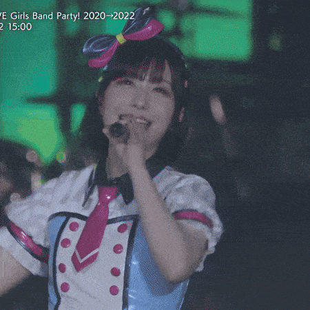 a girl singing into a microphone with the words give girls band party 2020-2022 below her