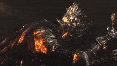 a knight with a crown on his head is laying on the ground