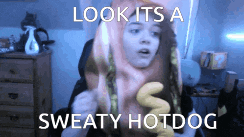 a girl in a sweaty hotdog costume says look its a sweaty hotdog