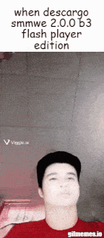 a man in a red shirt is making a funny face with the words when descarga smmwe 2.0.0 b3 flash player edition .