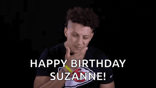 a young man in a chiefs shirt is making a funny face and saying happy birthday suzanne !