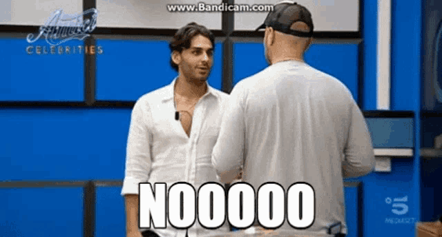 two men are standing next to each other and one of them says " nooooo "