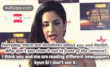 a woman is standing in front of a camera and talking about headlines about her and ranbir .