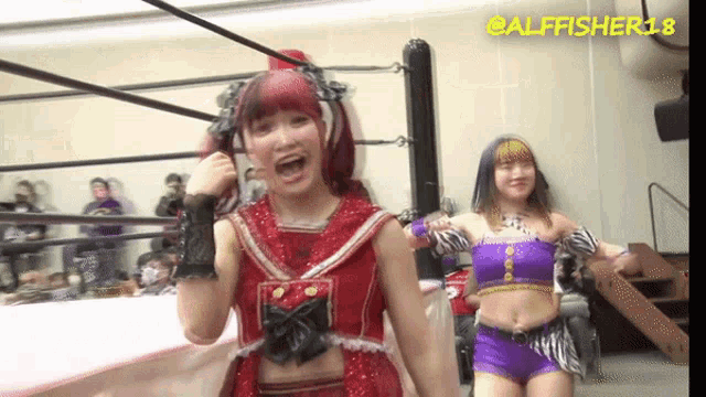 two women are in a wrestling ring with the name alfisher18 on the bottom