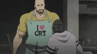 a man wearing an apron that says `` i love qrt '' is standing next to another man in a kitchen .