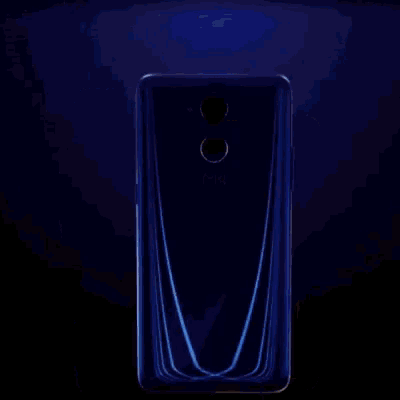 a blue and a white m4 phone are displayed on a dark background