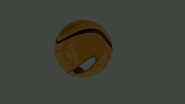 a yellow and red ball with black stripes on a gray background
