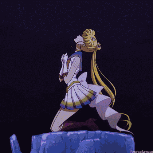a girl in a pink and white dress is kneeling down