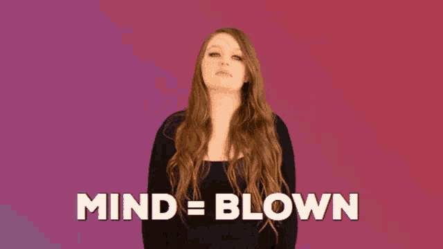 a woman with her hands in the air and the words mind blown above her