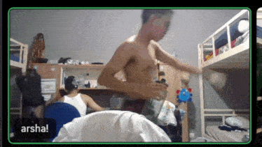 a man without a shirt is on a video call with the name arsha on the bottom right