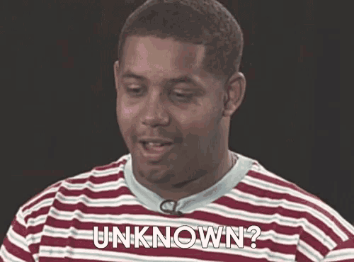 a man in a striped shirt is asking the question " unknown "