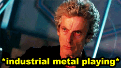 a picture of a man with the words industrial metal playing above him