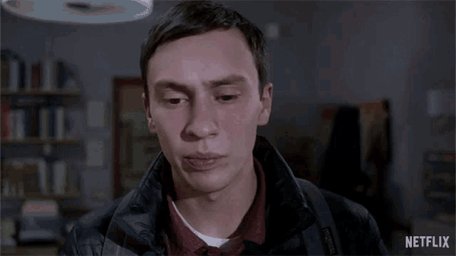 a close up of a man 's face with the words netflix on the bottom