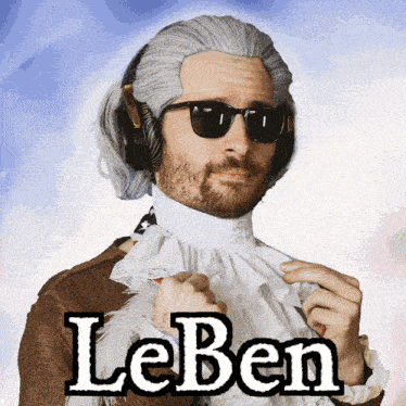 a man wearing a wig and sunglasses has the word leben on his shirt