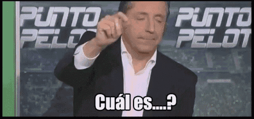 a man in a suit is covering his ear with his hand and says cual es ... ?