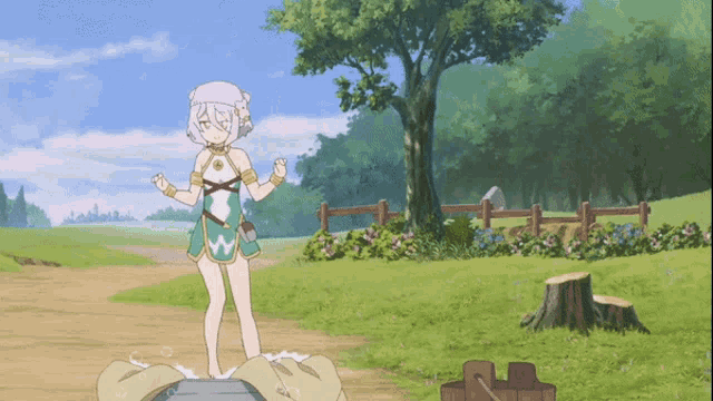 a girl in a bathing suit is standing on a rock