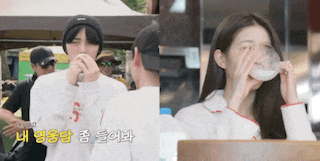 a man and a woman are drinking milk from glasses .