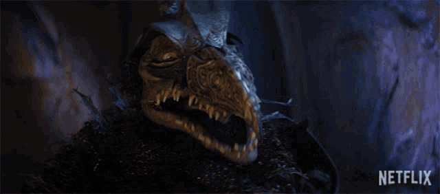a close up of a monster with a netflix logo in the background