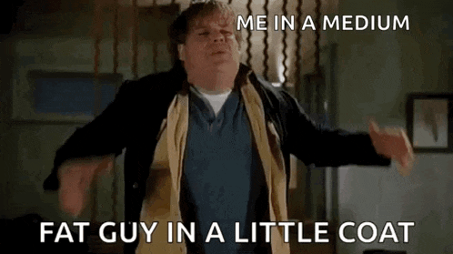 a fat guy in a little coat is standing in a room with his arms outstretched and screaming .