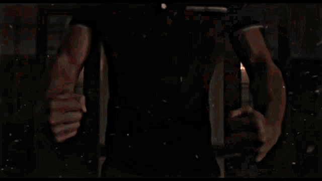 a person with flames coming out of their hands and chest