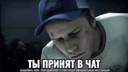 a man wearing a blue hat and a white shirt with the word ers on it