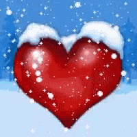 a red heart covered in snow and stars on a blue background .