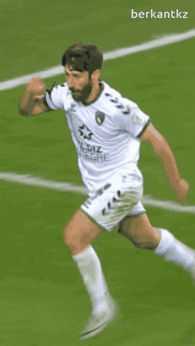 a soccer player wearing a shirt that says " yıldız integre "