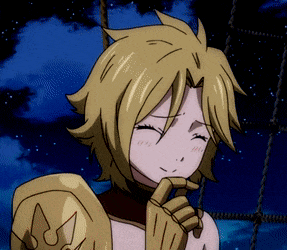 a girl with blonde hair and a gold armor is smiling