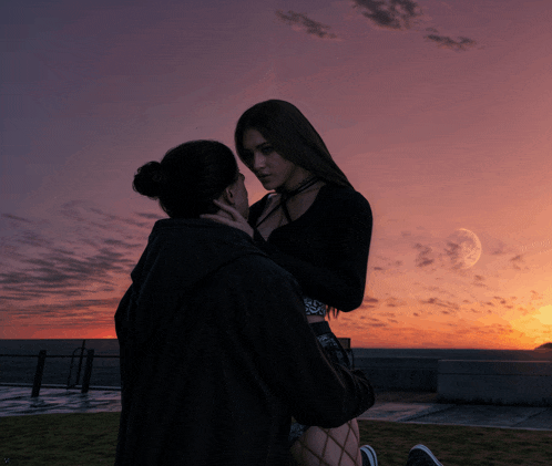 a man and a woman are kissing in front of a full moon