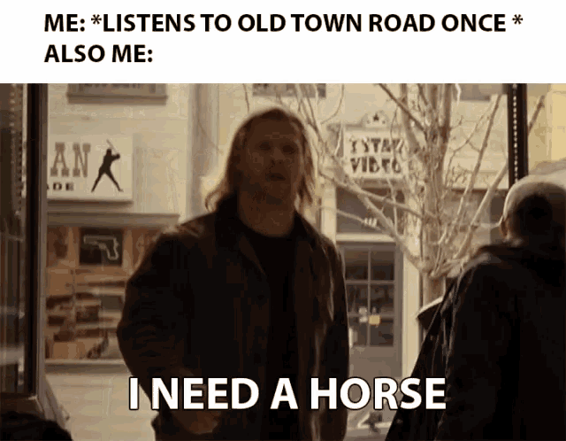 a man in a brown jacket says " i need a horse " in front of a store