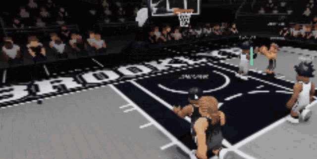 a basketball game is being played on a court with the word brooklyn on it