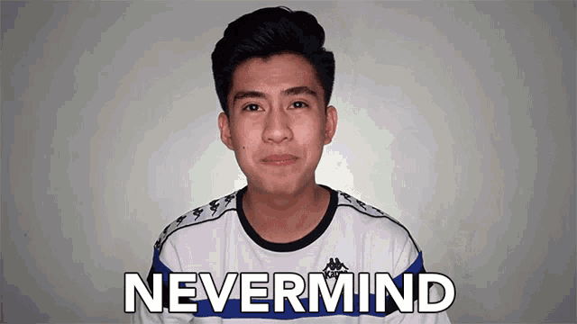 a young man is wearing a shirt that says nevermind
