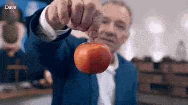 Bob Mortimer Apple GIF - Bob Mortimer Apple Tearing An Apple In Half GIFs